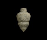 Indus Valley Ribbed Vessel
3rd-2nd millennium BC. A ceramic jar with tiered and stepped base, globular body, poppy-head neck. 229 grams, 15cm (6"). P...