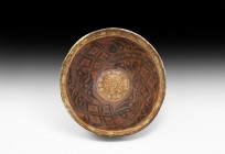 Large Indus Valley Decorated Bowl
2nd millennium BC. A large ceramic bowl with dimple base, central panel with bird and foliage within a geometric bo...