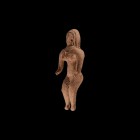 Indus Valley Fertility Figure
3300-1300 BC. A terracotta figurine with flexed arms and legs, large D-shaped headdress with recessed eyes and applied ...