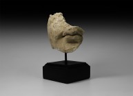 Gandharan Statue Mouth
1st-4th century AD. A fragment of a stucco statue or frieze comprising the finely modelled cheek, mouth and chin; mounted on a...