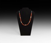 Buddhist Bead Necklace
1st millennium BC. A restrung necklace interstitial Pyu beads and later of biconvex carnelian beads with glass seed beads; mod...
