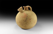 Indus Valley Mehrgarh Polychrome Vessel
3rd millennium BC. A large terracotta jug with globular body, short neck with flared rim and strap handle, th...