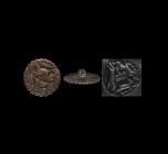 Very Large Indus Valley Stamp Seal with Animal
1st millennium BC. A large bronze seal matrix with dentilled edge and integral rear loop, design of th...