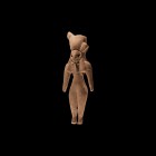 Indus Valley Fertility Idol
3rd-2nd millennium BC. A ceramic idol wearing a conical headdress with long lappets, slit mouth and deep recesses to the ...