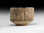 Indus Valley Mehrgarh Painted Vessel with Animals
3rd millennium BC. A ceramic cup with polychrome painted frieze including peepal leaf and grazing a...