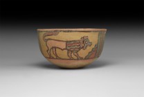Indus Valley Mehrgarh Painted Vessel with Animals
3rd millennium BC. A squat ceramic cup with polychrome painted frieze of geometric panels and wolve...