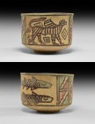 Indus Valley Mehrgarh Painted Vessel with Animals
3rd millennium BC. A ceramic cup with painted polychrome frieze of geometric panels, pair of fish a...