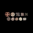 Indus Valley Stamp Seal Group
Late 3rd-2nd millennium BC. A mixed group of bronze seals with various shapes and designs, including three accompanied ...