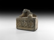 Gandharan Standing Statue Feet
2nd-4th century AD. A carved schist frieze fragment comprising a rectangular base with running band of rosette motifs,...