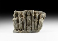 Gandharan Figural Frieze Section with Nude Female
2nd-4th century AD. A carved schist frieze fragment with high-relief design of a central nude femal...