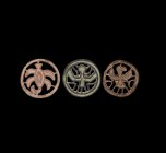 Indus Valley Stamp Seal Collection
23rd-20th century BC. A group of three bronze discoid seals, all with compartmented and open-work design, includin...