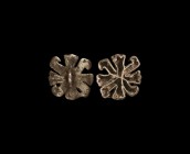 Indus Valley Silver Stamp Seal
Late 3rd millennium BC. A silver stamp seal of roughly square shaped formed as four schematic birds with eight curved ...
