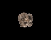 Islamic Quartz Lion Bead
13th-14th century AD. A carved quartz bead of a lion standing, notch detailing to the face mane and legs; pierced at the mid...