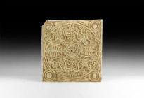 Islamic Tablet with Floral Interlace
17th century AD. A carved marble square plaque with reserved geometric pattern of a central rosette and radiatin...