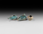 Islamic Blue Glazed Vessel Group
9th-12th century AD. A mixed group of blue-glazed ceramic vessels comprising: two slipper-shaped lamps with U-sectio...
