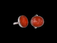 Islamic Timurid Calligraphic Gemstone in Silver Ring
14th century AD. A carnelian cloison, intaglio Kufic script text to the face, set into a later s...