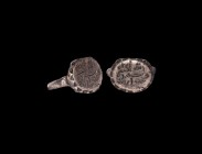 Islamic Silver Inscribed Ring
17th century AD. A silver ring comprising a D-section hoop, ellipsoid bezel with starburst to the underside and inscrip...