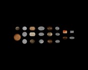 Islamic Gemstone Group
19th-20th century AD. A mixed group of plaques and cabochons in garnet, carnelian, haematite, rock crystal and other stones, e...