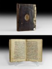 Islamic North African Prayer Book
Late 17th-early 18th century AD. A leather-bound prayer book with text in black with red and green highlighting, ma...