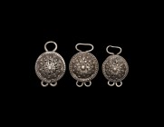 Qajar Belt Fitting Group
18th-early 19th century AD. A group of three white metal mounts, each an openwork dome with granule detailing, looped bar to...