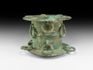 Islamic Khorasan Calligraphic Mortar with Rings
13th century AD. A substantial bronze mortar with domed underside, two large flange rims; bands of sc...