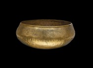 Islamic Large Qaznavid Inscribed Bowl
13th-14th century AD. A large copper bowl with rounded base, inward-sloping sides and a vertical rim; decorated...