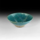 Islamic Blue Glazed Bowl
12th-13th century AD. A turquoise glazed footed bowl with turned rim and domed base. 473 grams, 22.5cm diameter (8 3/4"). Pr...