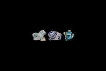 Islamic Glazed Animal Amulet Collection
13th-14th century AD. A mixed group of three white-glazed ceramic animal figurines with blue and turquoise de...