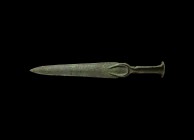 Western Asiatic Luristan Dagger with Crescents
1st millennium BC. A triangular-bladed dagger with rounded shoulders and lentoid-section blade; the hi...