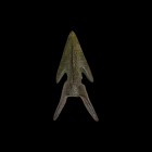 Greek Double-Barbed Arrowhead
5th-3rd century BC. A bronze arrowhead comprising a triangular barbed point with midrib, flared socket with transverse ...