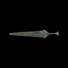 Western Asiatic Luristan Ceremonial Dagger
13th-6th century BC. A flat bronze dagger with triangular blade and rounded tip, flared lower guard, narro...