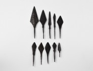 Medieval Arrowhead Collection
10th-15th century AD. A group of iron tanged arrowheads, mainly lozenge-shaped and one with three radiating edges. 66 g...