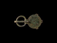Roman Military Buckle with Plate
2nd-4th century AD. A bronze military buckle comprising: a circular loop with ribbing; a D-section tongue with forwa...