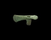 Western Asiatic Luristan Socketted Axehead
13th-6th century BC. A bronze axehead with short tubular socket and flared blade, ring-and-dot to the uppe...