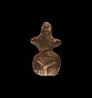Neolithic Standing Idol
3rd millennium BC. A ceramic figural idol with naive pinched head and face, stub arms with piercing to the obverse, narrow wa...