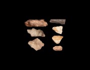 Mesolithic Scraper and Blade Group
12th-5th millennium BC. A mixed group of knapped stone implements including triangular scrapers, a pointed burin a...