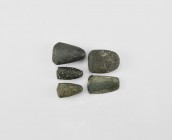 Neolithic Polished Axehead Collection
5th-3rd millennium BC. A mixed group of polished diorite and other stone axeheads, most with rounded section an...