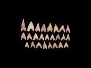 Neolithic Barbed Arrowhead Group
6th-4th millennium BC. A large group of barbed arrowheads in cream and white chert. 18.7 grams total, 17-32mm (3/4 -...