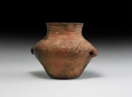 Neolithic Decorated Vessel
3rd millennium BC. A biconvex ceramic pot with broad neck and everted rim, impressed cord detailing to the neck and should...