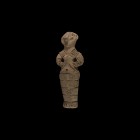 Vin?a Female Idol
6th-4th millennium BC. A large ceramic figurine of a standing female with prominent nose and long hair, hands resting on the waist,...
