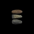 Neolithic Stone Axehead Group
6th-4th millennium BC. A group of three pecked and ground diorite axeheads from North West Sahara. 533 grams total, 9.5...