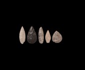 Neolithic Arrowhead Collection
7th-5th millennium BC. A group of five stone arrowheads comprising: two leaf-shaped in good quality flint from Europe;...