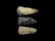 Neolithic Polished Axehead Group
5th-2nd millennium BC. A mixed group comprising: three knapped and polished flint axeheads each with narrow rounded ...