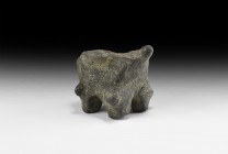 Vin?a Animal Vessel
6th-4th millennium BC. A dark grey ceramic thumb-pot with four stub legs, lateral flanges to the rim and conical lug; zoomorphic ...