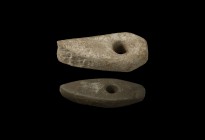 Neolithic Polished Axehead Group
5th-2nd millennium BC. A mixed group of knapped and polished stone axeheads with drilled socket: one boat-shaped wit...