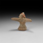 Anatolian Terracotta Figural Mount
2nd millennium BC. A terracotta mount of a male figure with pointed cap, incised lentoid eyes and pinched nose, mu...