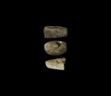 Neolithic Polished Axehead Group
5th-2nd millennium BC. A mixed group of knapped and polished stone axeheads with drilled socket: one with square edg...