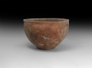 Bronze Age Decorated Bowl
16th-14th century BC. A substantial broad terracotta bowl with narrow discoid base, slightly everted rim, band of impressed...