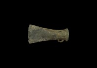 Bronze Age Looped and Socketted Axehead
1st millennium BC. A socketted bronze axehead with flared blade, loop below, thickened collar to mouth. 165 g...
