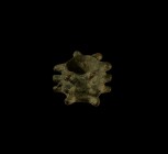 Bronze Age Spiked Mace Head
2nd millennium BC. A small bronze tubular collar with six rows of three radiating spikes to the outer face. 24 grams, 28m...